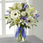 Reference # B19-5142
Starting at $ 44.99
Blue iris catch the eye arranged amongst a bed of snowy white flowers including roses, gerbera daisies, Asiatic Lilies, and Peruvian  Lilies.