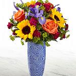 Reference # 18S1-D
Starting at $ 54.99
Touch of Spring® Bouquet brings fresh beauty and color to your special recipient's door.! Bold sunflowers and orange roses take center stage of this fresh flower arrangement . 
Starting at $ 54.99 
