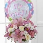 Reference #  D7- 4904
Starting at $54.95
White roses, white Peruvian lilies, pink carnations, pink matsumoto asters, pink Asiatic lilies and lush greens are beautifully arranged in a round whitewash woodchip basket. Presented with a mylar balloon declaring, "It's a Girl!"