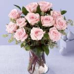 Reference #  E8-4304
Starting at 59.99
Picture-perfect soft pink roses make a beautiful gift for the lovely lady in your life. Wife, mother, daughter or sweetheart, she's sure to cherish this bouquet of pastel pink roses accented with seeded eucalyptus and arranged in a clear glass vase. 
