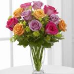 Reference # E6-4821
Starting at $ 89.99
Hot pink, lavender and orange roses create a splash of color accented with lush bupleurum to make an exceptional flower bouquet. Presented in a modern clear glass vase, 