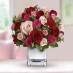 Reference # T400-2A
Starting at  $ 74.99
 The stylish deluxe bouquet features a generous amount of large red and pink roses accented with smaller spray roses in shades of red and pinks. Delicate green oregonia and pittosporum add a fresh contrast.