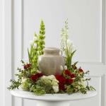 Reference # S17-4473
$199.00
 Arrangement is an elegant way to surround their urn with floral beauty at the final farewell service. Rich red roses and spray roses are vivid and bright amongst white tulips, larkspur, hydrangea and trachelium.