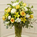 Reference # 91298
As shown $109.00

Features the freshest yellow roses, white football mums, stock, snapdragons and more