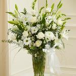 Reference # 91302
As shown $ 109.00
Send your most sincere condolences and beauty in times of sorrow with our elegant all-white sympathy arrangement.
Features the freshest white roses, hybrid lilies, cremones.
