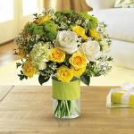 Reference # TEV11-1
Starting at
This charming bouquet includes white roses, yellow spray roses, green carnations, green button spray chrysanthemums and white waxflower accented with assorted greenery