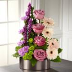 Reference # C23-5188
Starting at $69.99
Possessing a vertical design that features color blocks of blooms, this artistic flower bouquet has lavender roses at the center surrounded by hot pink gerbera daisies, purple liatris,& lavender carnations, accented by green button poms and myrtle leaves.