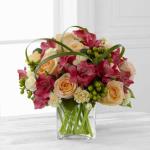 Reference # C15B-4950
Starting at $49.99
Unforgettable peach roses are surrounded by red Peruvian lilies, pale yellow mini carnations, green hypericum berries, lily grass blades, and lush greens to create a stunning flower arrangement. Presented in a clear glass cube vase .