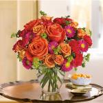 Reference # t46-1b
Starting at $ 39.95
Send it to sweeten a best friend''s birthday, say "hi" to mom, or delight your better half.Light orange roses, orange spray roses, and matsumoto asters, hot pink miniature carnations and more are delivered in a lovely glass vase