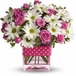 Reference # T52
Starting at $ 39.99

This energetic pink and white bouquet pairs fresh white daisies with hot pink roses in a light pink glass cube vase. 

