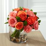 Reference # E8-5235
Starting at $ 69.99
Orange roses hand-tied to provide a rounded and full form. Casually placed in a large clear glass cylinder vase with river rocks at the bottom to create even further interest, this fresh floral arrangement will be an unforgettable 