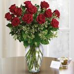 Reference# T64-1A
Starting at $ 89.99
The classic romance of a dozen red roses can say so many things, from "I love you!" to "I'm sorry." Stunning in its simplicity, this elegant arrangement of deep red roses, rich green salal and delicate pitta negra makes quite an impression.