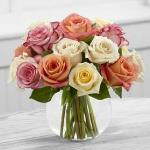 Reference # E9-4817                     Starting at $  79.99                         Cream, white, orange and pink roses are simply brought together in a clear glass bubble bowl vase to make an exquisite flower bouquet set to warm their heart when extending your warmest wishes.