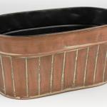 Reference # VIN 51215
Copper Oval Planter 
10" x 5.5" 
with flowers $ 45.00 
