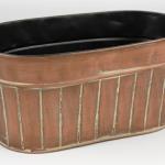 Reference # VIN 51215
Copper Oval Planter 
10" x 5.5" 
with flowers $ 45.00 